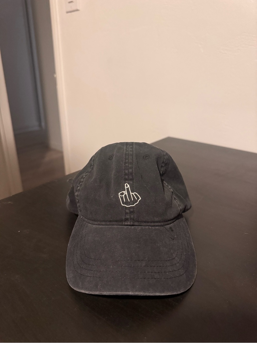 Middle finger black hat